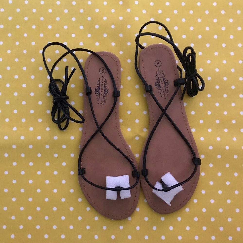 Black gladiator wrap sandals. NWT. Size 8